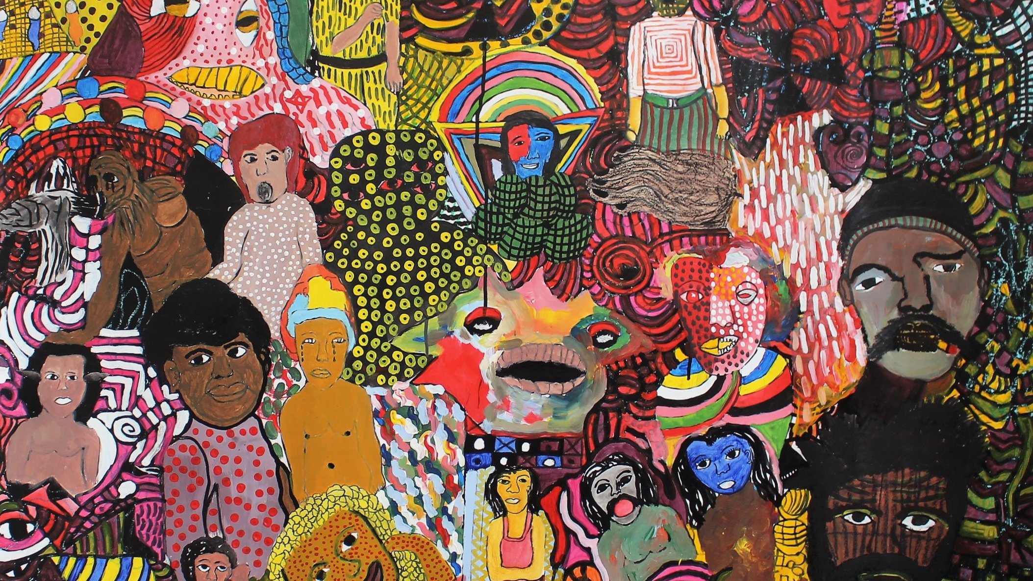 L'image est une composition artistique vibrante, remplie de motifs colorés et de visages divers. On y trouve des figures humaines, représentées de manière stylisée, avec des expressions variées. Les visages sont entourés de formes abstraites et de dessins géométriques, créant une atmosphère dynamique et joyeuse. Les couleurs utilisées sont essentiellement des teintes vives, incluant des rouges, des jaunes, des verts et des bleus, qui se mêlent harmonieusement. Les différents éléments de l'image semblent interagir, formant un ensemble riche et captivant qui évoque à la fois l'énergie et la diversité des émotions humaines.