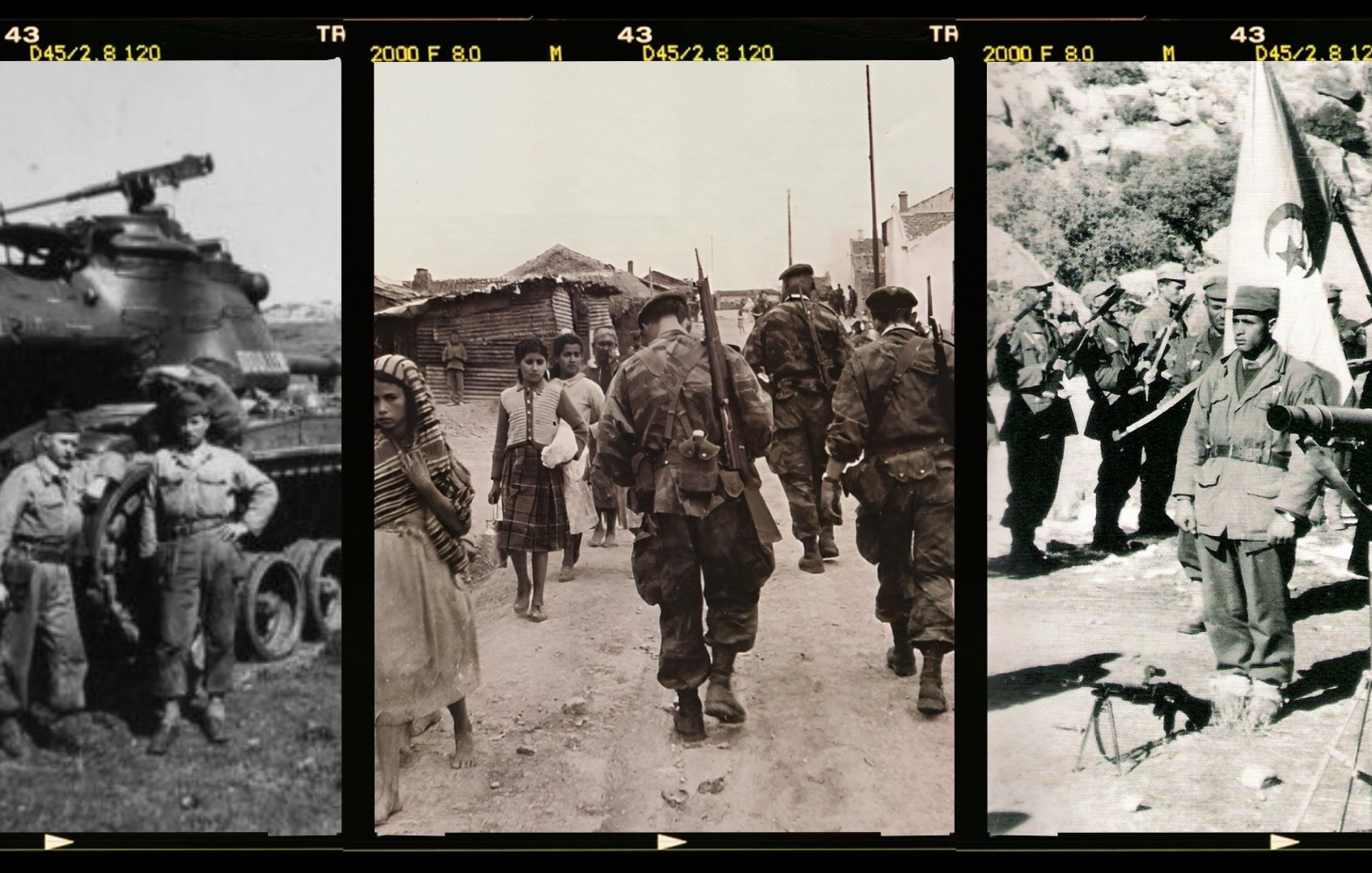 L'image se compose de trois photographies en noir et blanc alignées horizontalement. 1. **Première photo** : Deux soldats, souriants, posent côte à côte devant un char d'assaut. L'un d'eux porte une tenue militaire décontractée. En arrière-plan, le char est bien visible, renforçant l'idée d'un moment de camaraderie en temps de guerre. 2. **Deuxième photo** : Un groupe de soldats marche sur un chemin, entouré de maisons modestes. Parmi eux, on peut distinguer quelques civils, en particulier des enfants, qui semblent observer les militaires. L'atmosphère évoque un mélange de curiosité et de tension. 3. **Troisième photo** : Plusieurs hommes en uniforme se tiennent au garde-à-vous, avec une bannière brandie par l'un d'eux. Les expressions sont sérieuses, laissant transparaître un sentiment de détermination et d'unité. L'environnement est montagneux, ce qui ajoute un contexte à la scène. L'ensemble de ces images évoque des moments historiques marqués par la présence militaire et les interactions entre soldats et civils.